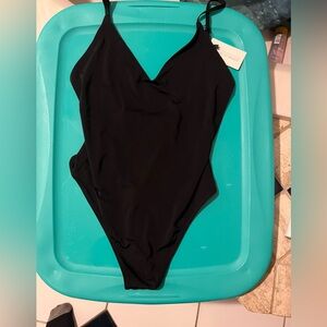 Land of woman body suit brand new